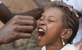 Photo reprinted courtesy Julien Harneis via Flickr, https://flic.kr/p/7nxFhf Polio vaccination