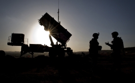 U.S. Soldiers with the 3rd Battalion, 2nd Air Defense Artillery Regiment talk after a routine inspection of a Patriot missile battery at a Turkish military base in Gaziantep, Turkey. U.S. and NATO Patriot missile batteries and personnel deployed to Turkey in support of NATO's commitment to defending Turkey's security during a period of regional instability.