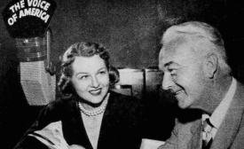 Photo of Jo Stafford with guest William Boyd AKA Hopalong Cassidy on her Voice of America radio show.
