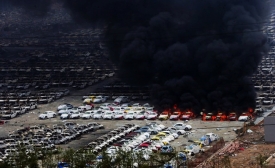 Cars burn in Tianjin after the explosion
