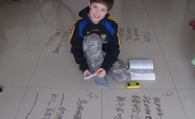 A young student learns Chinese.