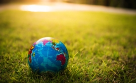 Image of globe ball on field via iStock