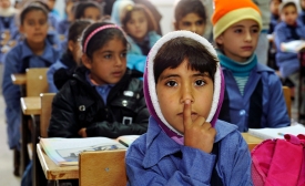 Photo: Children inside a classroom at Za’atri refugee camp, host to tens of thousands of Syrians displaced by conflict, near Mafraq, Jordan by United Nations Photo/Mark Garten via Flickr. 