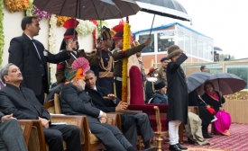 President Barack Obama speaks with Prime Minister Narendra Modi at the 2015 Republic Day Parade