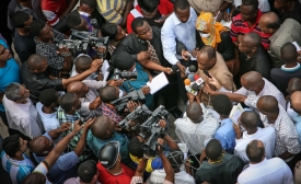 Police Commissioner Suleiman Kova answers and addresses the media at ground zero near the 2013 Dar es Salaam building collapse