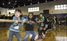 Students play at the U.S.-Japan Friendship Exchange at the Marine Corps Air Station in Iwakuni, Japan