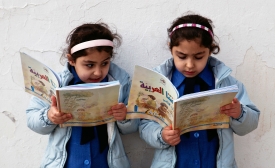 Young girls reading