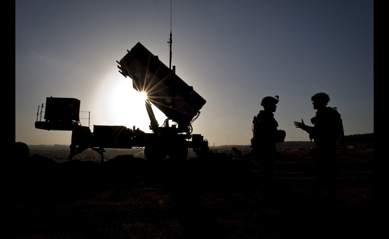 U.S. Soldiers with the 3rd Battalion, 2nd Air Defense Artillery Regiment talk after a routine inspection of a Patriot missile battery at a Turkish military base in Gaziantep, Turkey. U.S. and NATO Patriot missile batteries and personnel deployed to Turkey in support of NATO's commitment to defending Turkey's security during a period of regional instability.