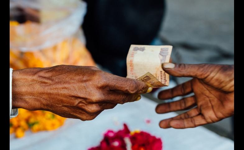 Rupees Exchanging Hands