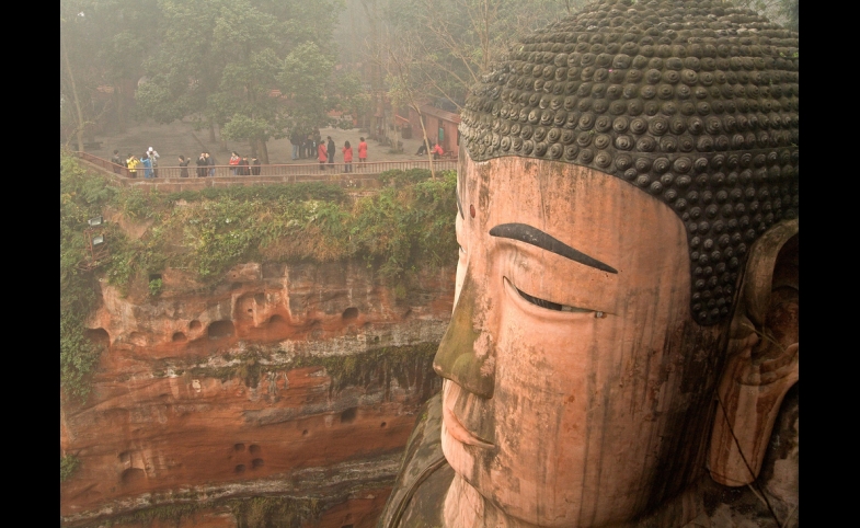 Giant Buddha sculpted into the cliff at Leshan, China