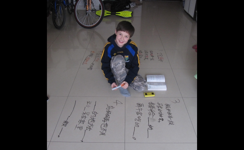 A young student learns Chinese.