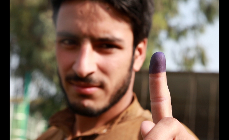 An Afghan man votes in Khost Province, Afghanistan.