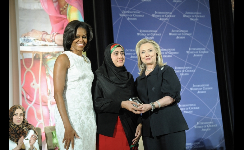 Secretary Clinton and First Lady Obama IWOC  by U.S. Department of State