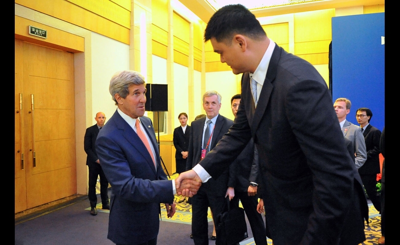 Photo reprinted courtesy U.S. State Dept. via Wikimedia Commons John Kerry conducts some diplomacy with Yao Ming