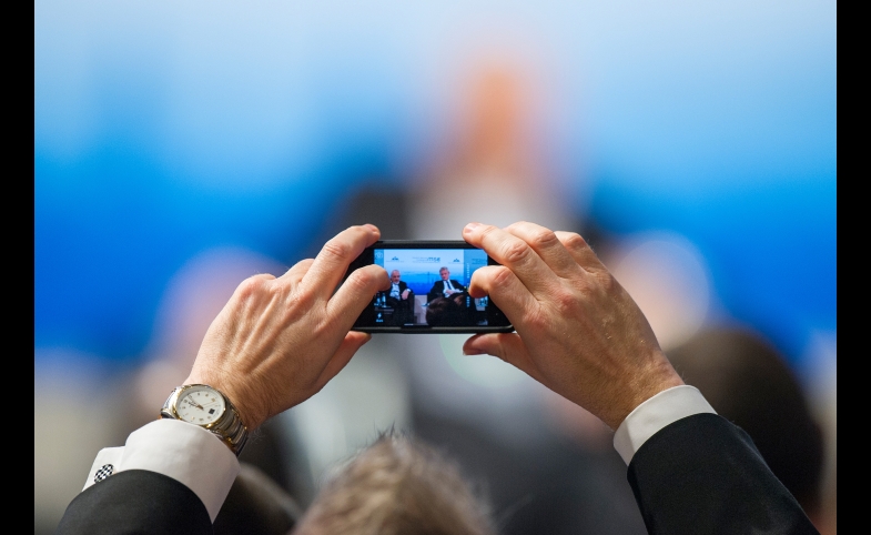 An audience member takes a photo at the 50th Munich Security Conference 2014: Diplomacy in a Digital Age: Diplomacy in a Digital Age