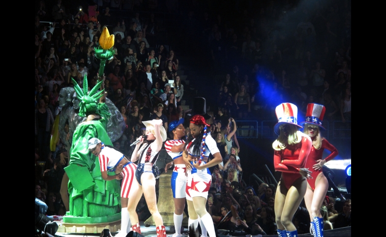 Photo reprinted courtesy karina3094, via Wikimedia Commons Miley Cyrus performs "Party in the U.S.A."