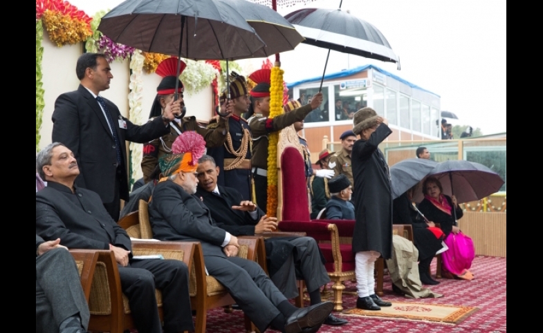 President Barack Obama speaks with Prime Minister Narendra Modi at the 2015 Republic Day Parade