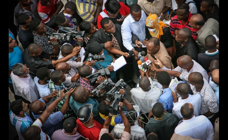 Police Commissioner Suleiman Kova answers and addresses the media at ground zero near the 2013 Dar es Salaam building collapse