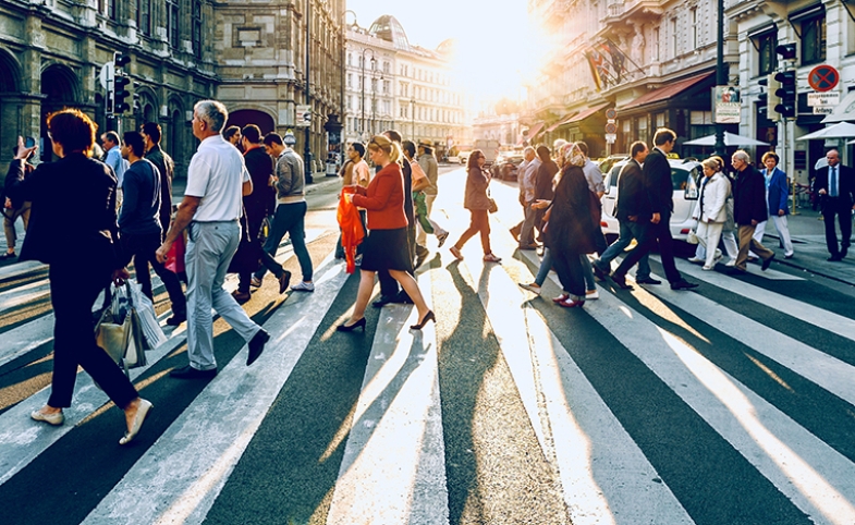 Ordinary people crossing the street by Jacek Dylag via Unsplash