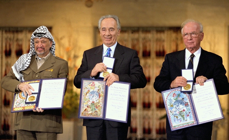 Photo reprinted courtesy of Saar Yaacov via Wikimedia Commons Nobel Peace Prize Laureates for 1994 in Oslo