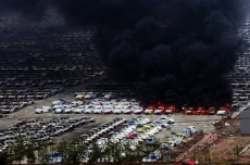 Cars burn in Tianjin after the explosion