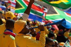 Photo reprinted courtesy Andrew Moore, via Flickr https://flic.kr/p/89KNj5 Fans at the 2010 FIFA World Cup in South Africa