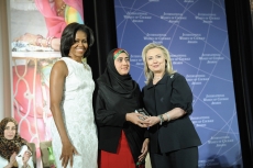 Secretary Clinton and First Lady Obama IWOC  by U.S. Department of State