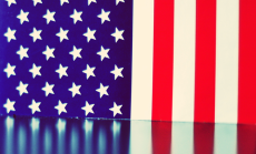 CC BY-NC-SA 2.0 | Image by Luigi Anzivino via Flickr.com American flag reflection. CC BY-NC-SA 2.0 | Image by Luigi Anzivino via Flickr.com