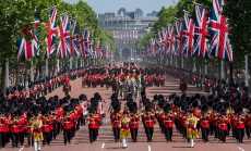 Queen Elizabeth II and royal family return from Trooping the Colour in 2018 with Admiralty Arch in the background