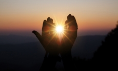 Spiritual hands with sunlight image by jcomp via freepik.com