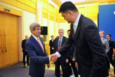 Photo reprinted courtesy U.S. State Dept. via Wikimedia Commons John Kerry conducts some diplomacy with Yao Ming