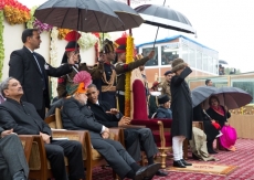 President Barack Obama speaks with Prime Minister Narendra Modi at the 2015 Republic Day Parade