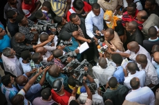 Police Commissioner Suleiman Kova answers and addresses the media at ground zero near the 2013 Dar es Salaam building collapse