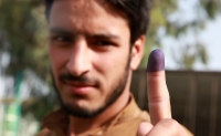 An Afghan man votes in Khost Province, Afghanistan.