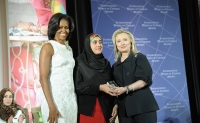 Secretary Clinton and First Lady Obama IWOC  by U.S. Department of State