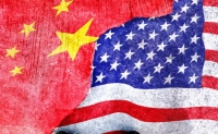 Image of the US and Chinese flags via Canva Image of the US and Chinese flags via Canva