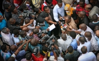 Police Commissioner Suleiman Kova answers and addresses the media at ground zero near the 2013 Dar es Salaam building collapse