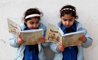 Young girls reading